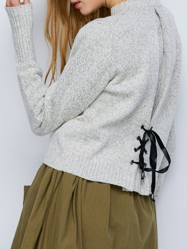 Tie sweater met een rok