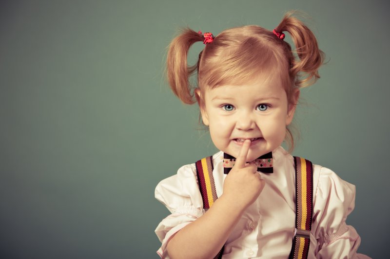 Fată cu Ponytails