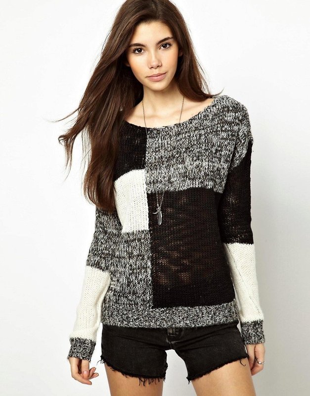 Fille dans un pull style patchwork