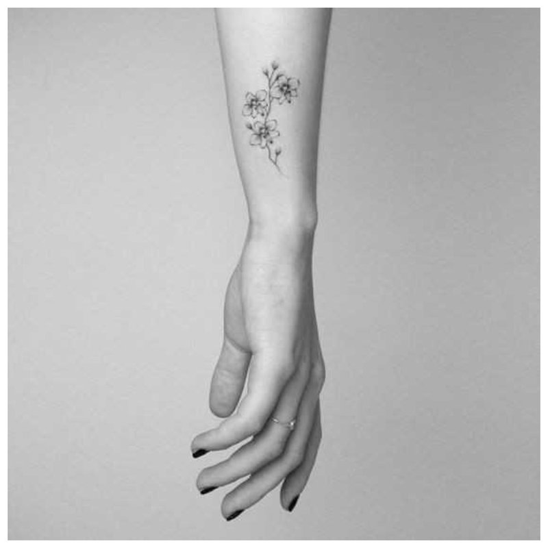 Delicate Flower Tattoo