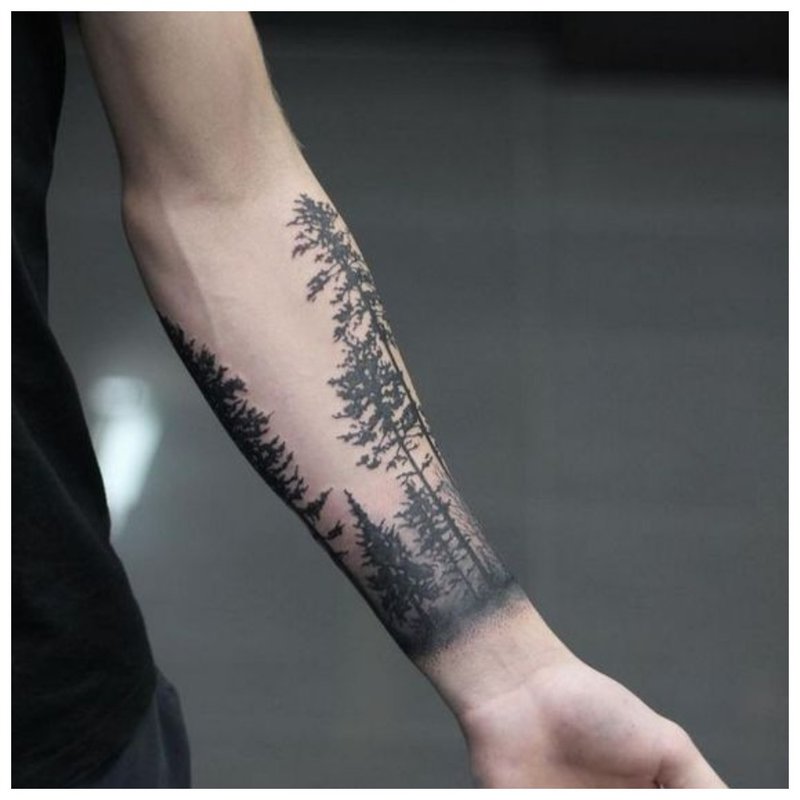 Tattoo landschap man aan kant